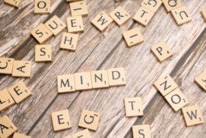 Habits that improve mental clarity. Image shows letter tiles spelling out ‘mind’ 
