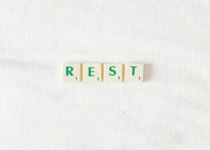 Image shows letter tiles spelling out ‘Rest’ 