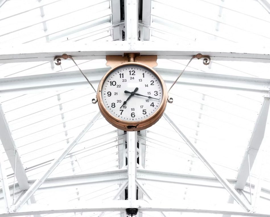 Why everything feels urgent. Image shows a clock in a station 