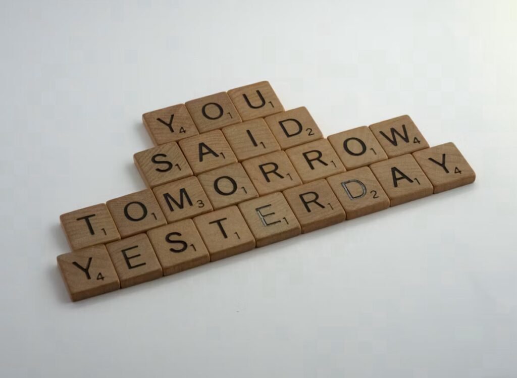 Image shows letter tiles reading ‘you said tomorrow yesterday’ 
